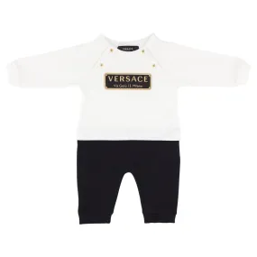 Versace cream baby suit with logo